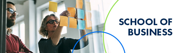 Two business professionals collaborating on a board with sticky notes, with 'SCHOOL OF BUSINESS' text.